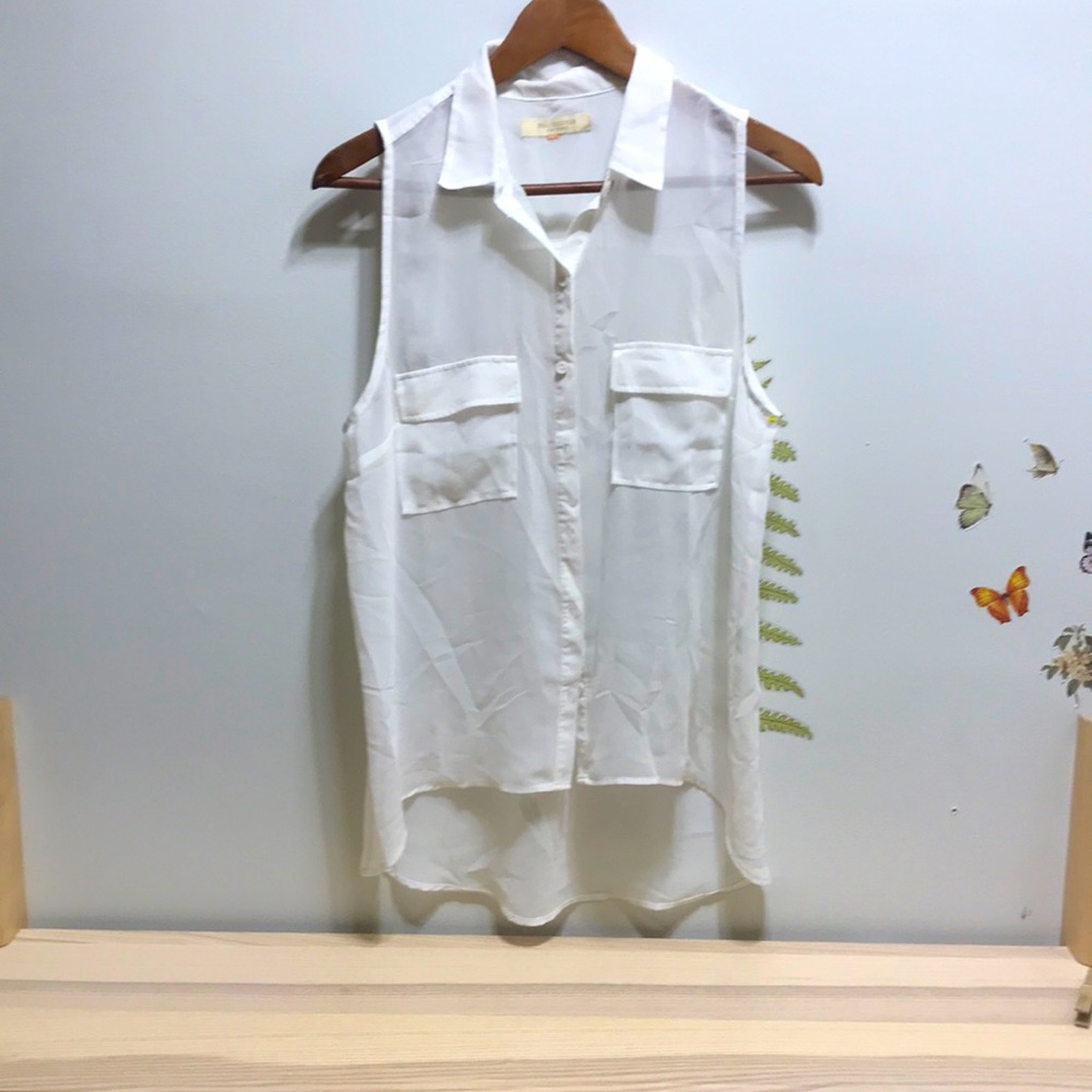 Sheer white sleeveless blouse